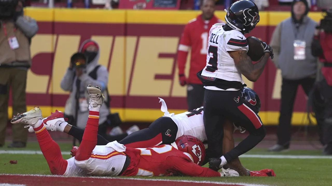 Texans WR Tank Dell carted off with knee injury after TD catch vs Chiefs