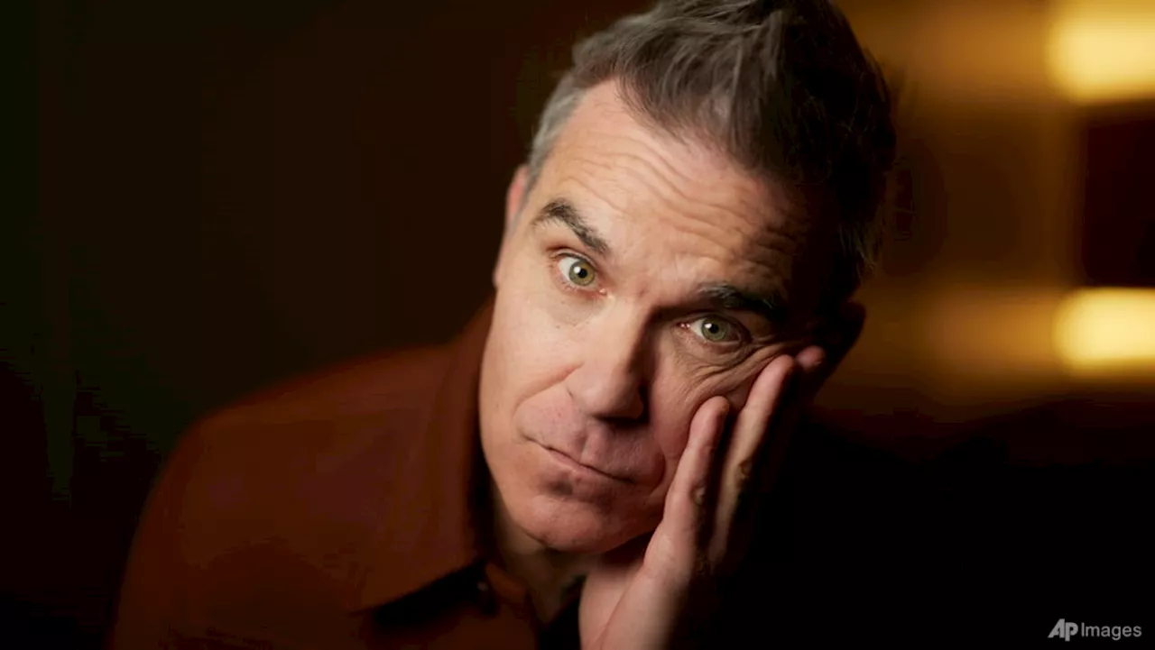 Robbie Williams: 'Something about this matrix-bending, washing-machine fame that’s deeply unhealthy'