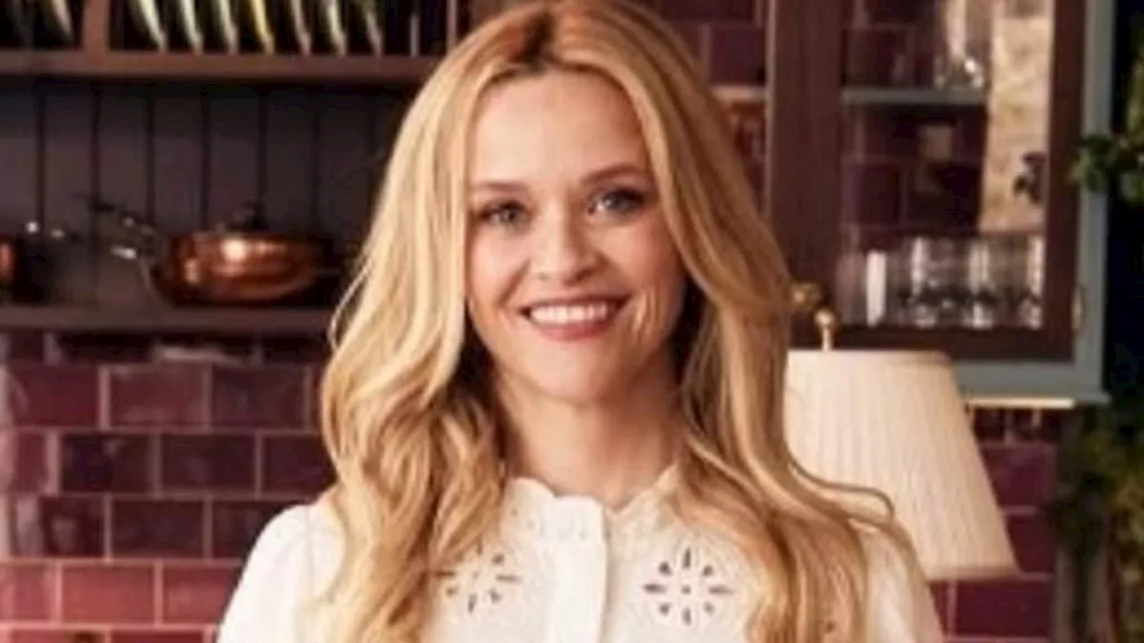 Christmas cards from Reese Witherspoon and Lili Reinhardt show stars getting cozy at home