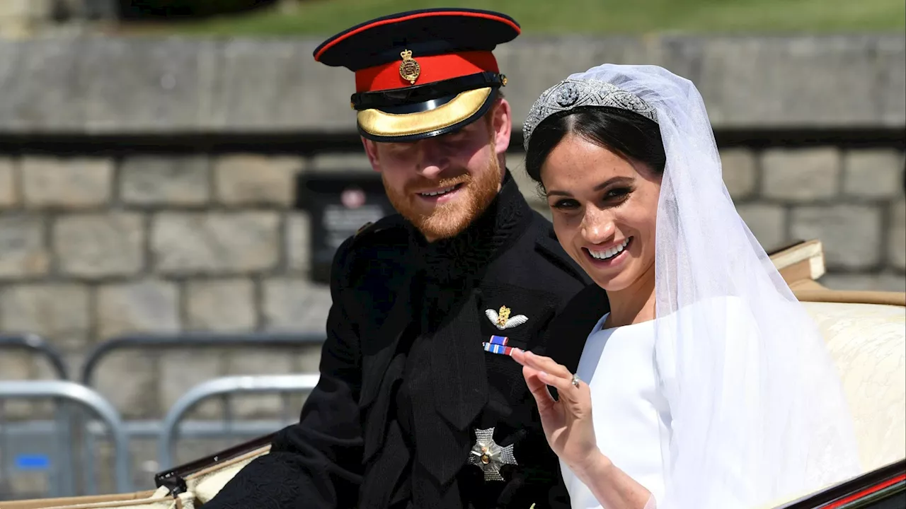 Queen Elizabeth disapproved of Meghan ignoring long-standing royal protocol on her wedding day, book claims...