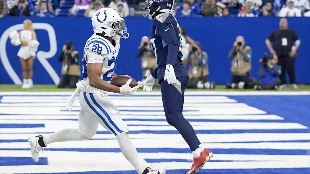 Jonathan Taylor rebounds with 218 yards, 3 TD runs as Colts hold off Titans 38-30