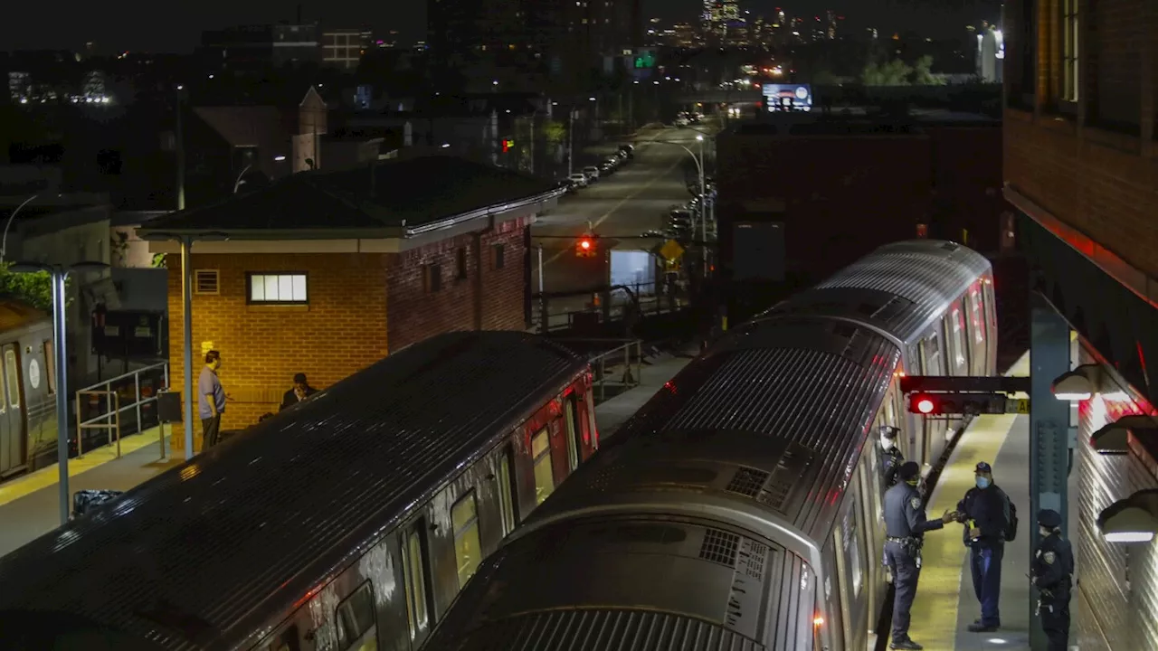 New York City police investigate the death of a woman found on fire in subway car