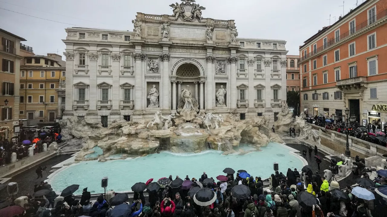 Rome's iconic Trevi Fountain reopens after renovation work in time for the Jubilee Holy Year