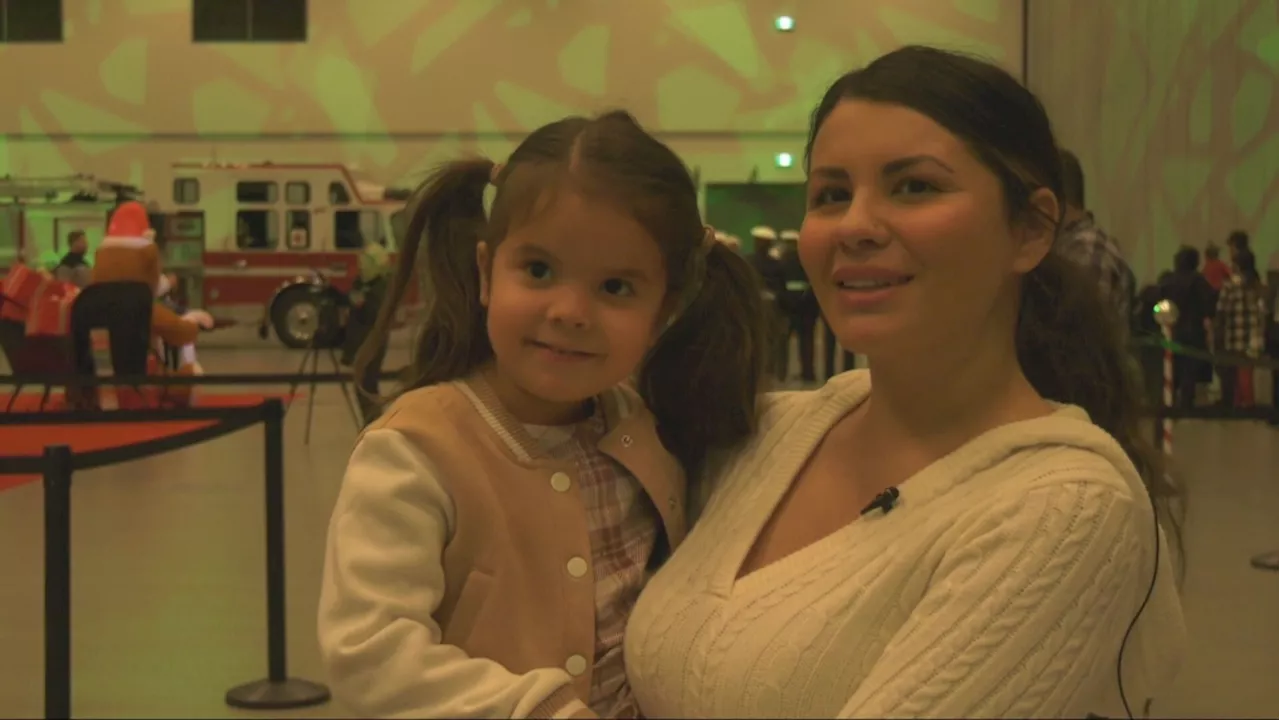 Calgary Firefighters Toy Association throws a Christmas party for thousands of kids at Telus Centre