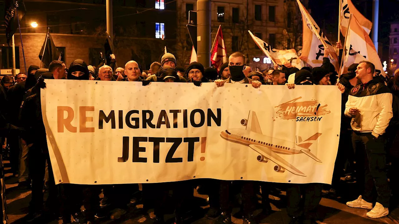 Furious German protesters take to the streets to demand mass deportations as anger at Angela...