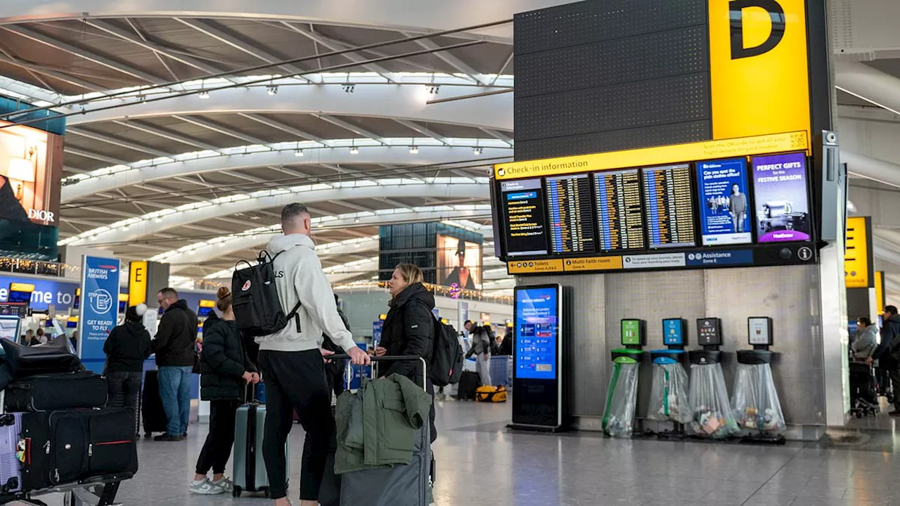 Heathrow getaway chaos as 70 flights are cancelled and several more delayed due to 'severe' gales...