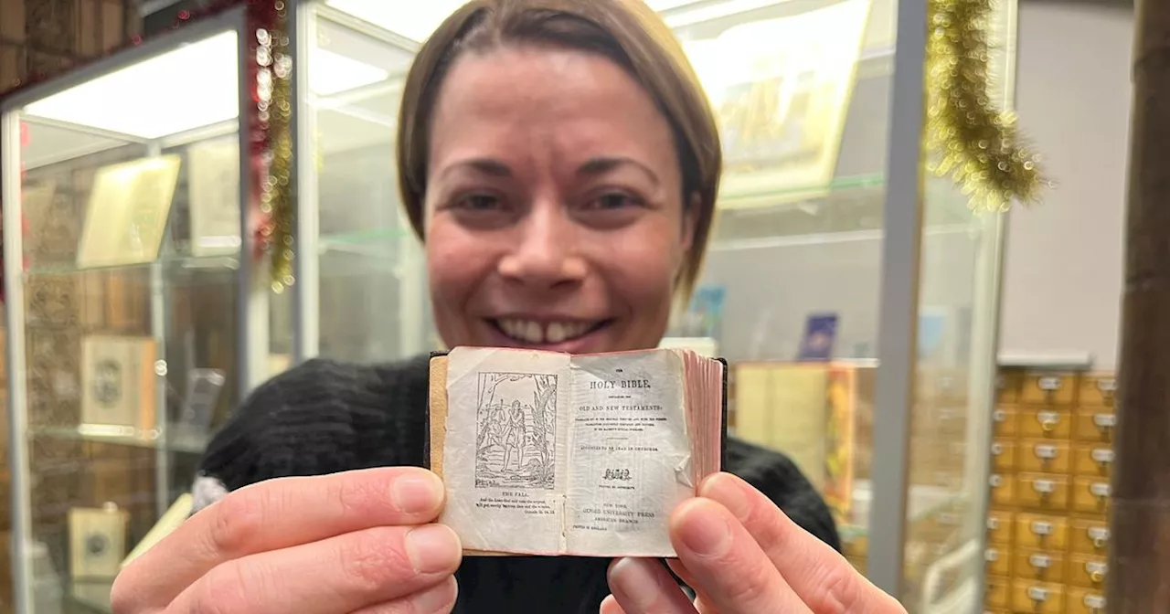 Tiny bible with Christmas story on display in Leeds - magnifying glass needed