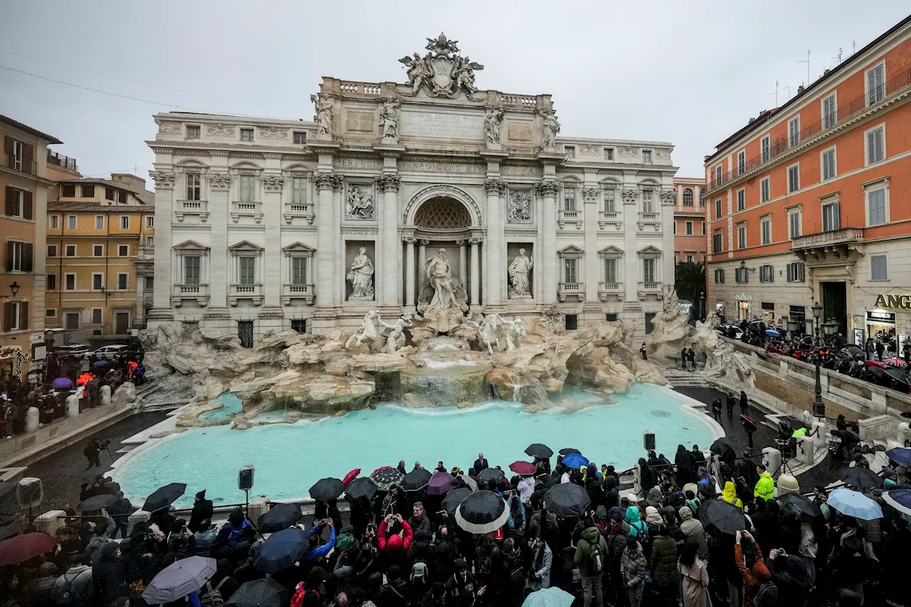 Rome's iconic Trevi Fountain reopens after renovation work in time for the Jubilee Holy Year