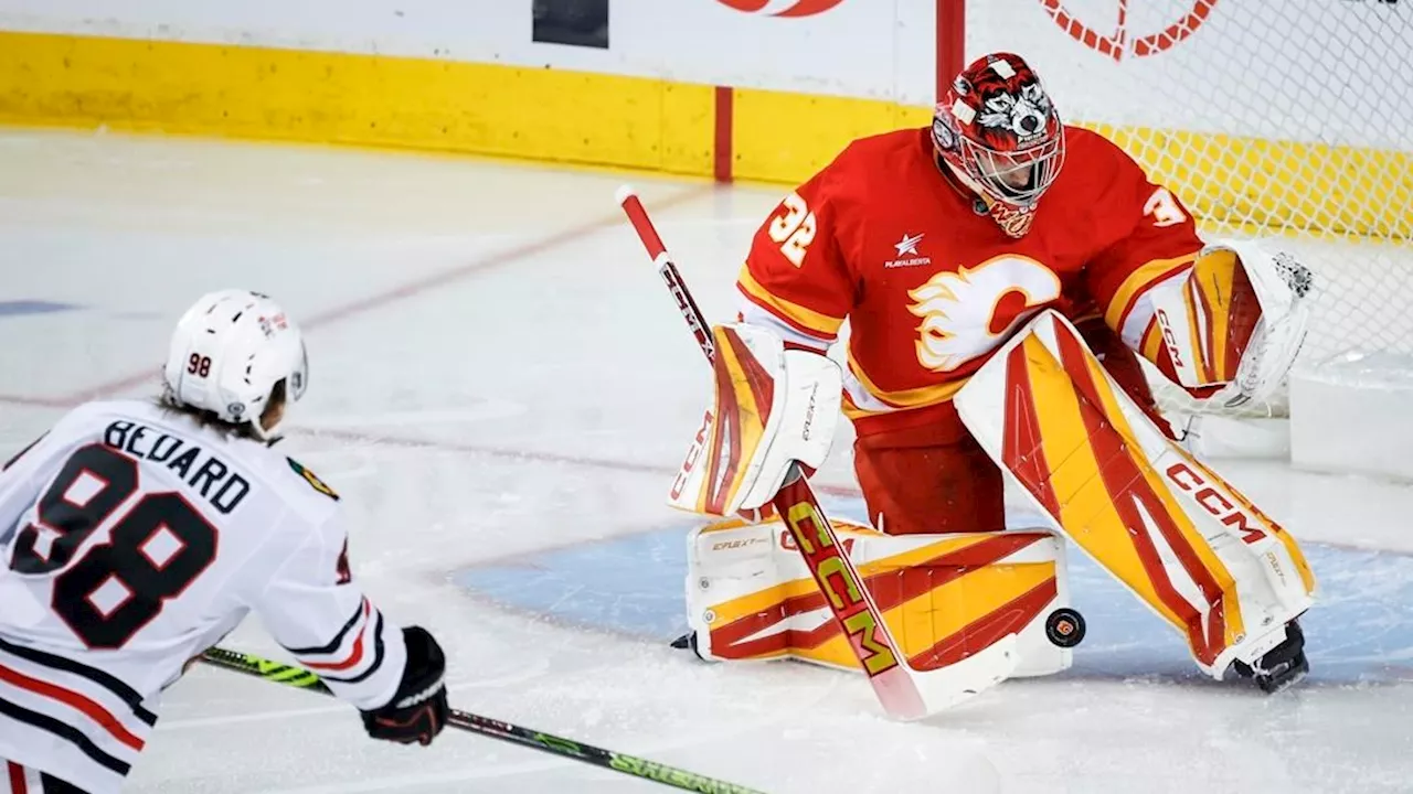 Flames stay tough at Saddledome, hold off Blackhawks