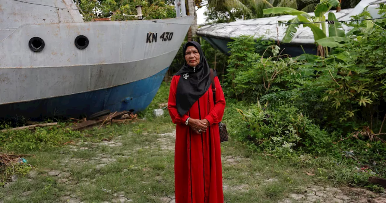 Indonesian tsunami survivor holds on to hope for missing son after 20 years