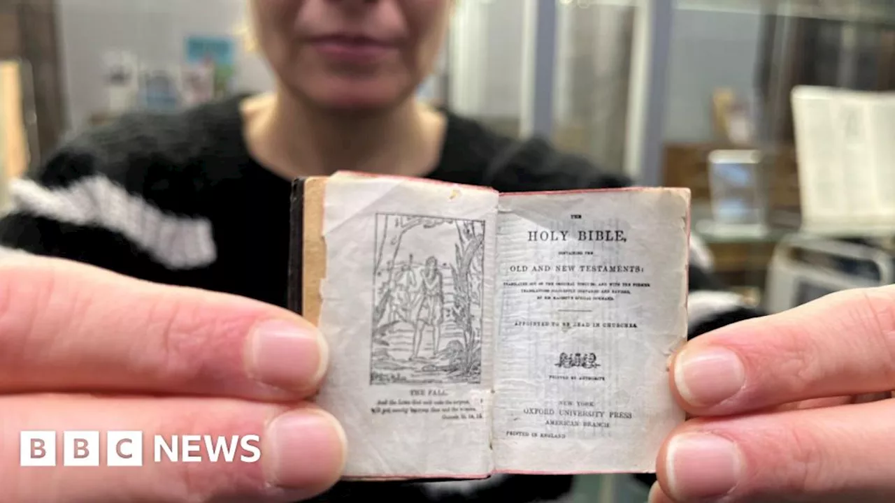 Tiny bible features in Christmas book display at Leeds library