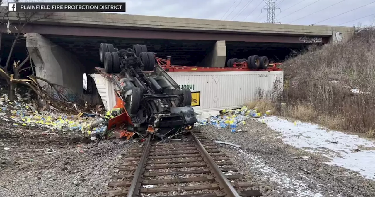 Semi-trailer truck goes off I-55, spills chicken broth and disinfectant wipes onto railroad southwest of Chicago