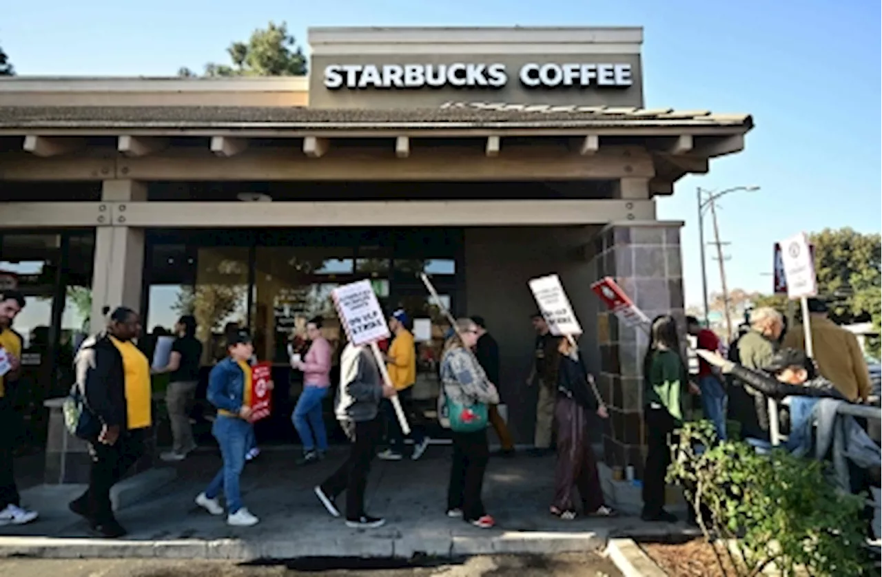 Starbucks workers expand strike in US cities including New York, warn will reach ‘hundreds of store’