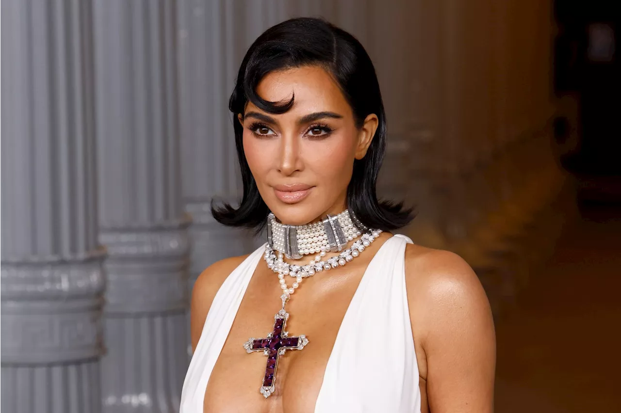 Kim Kardashian Unveils Travis Barker-Produced Take on ‘Santa Baby’