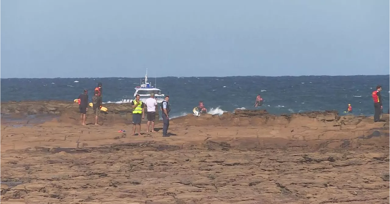 Desperate search for teenager swept off rocks on NSW Central Coast