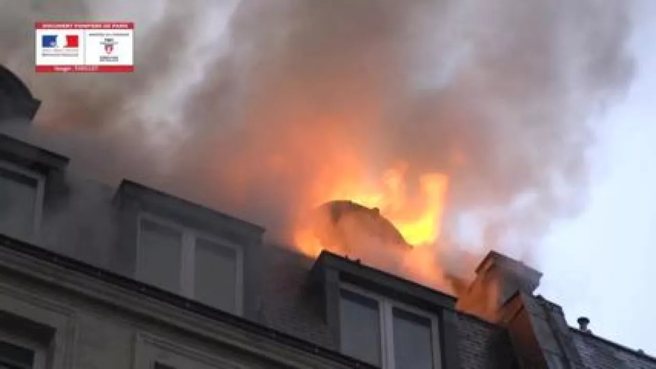 Fire engulfs building near Paris train station