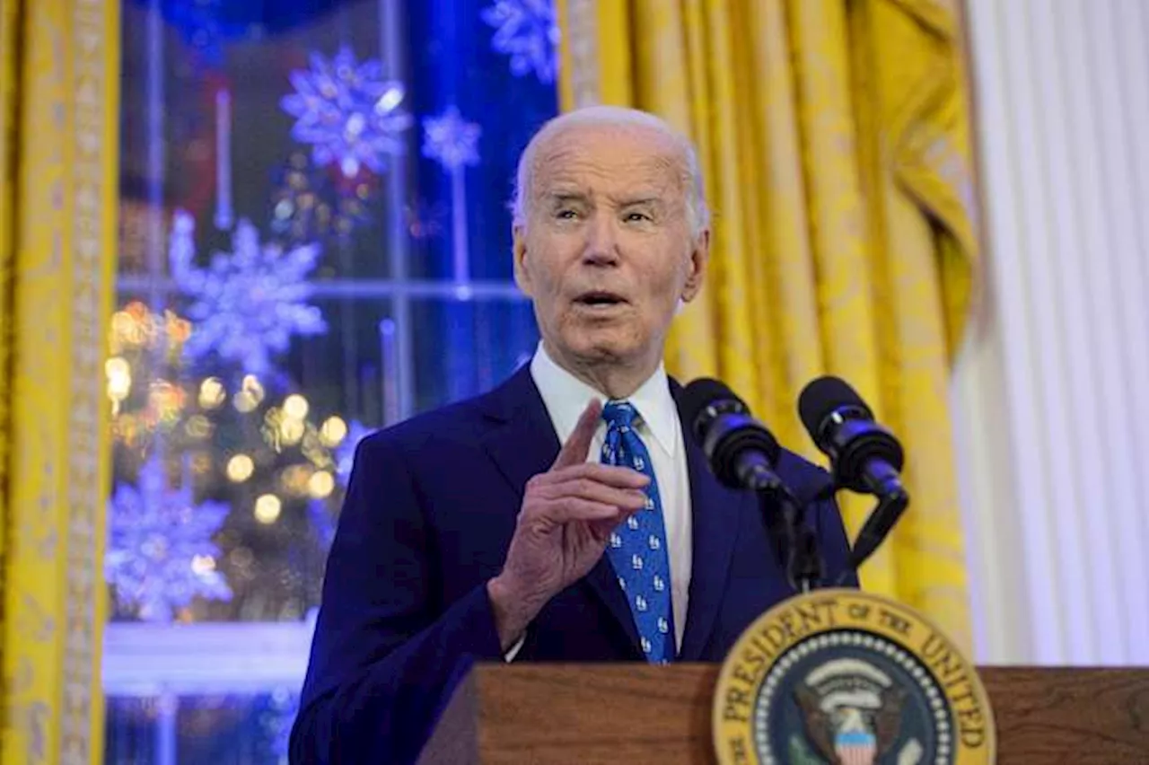 Biden Signs Defense Bill Despite Objections to Transgender Care and Guantanamo Restrictions