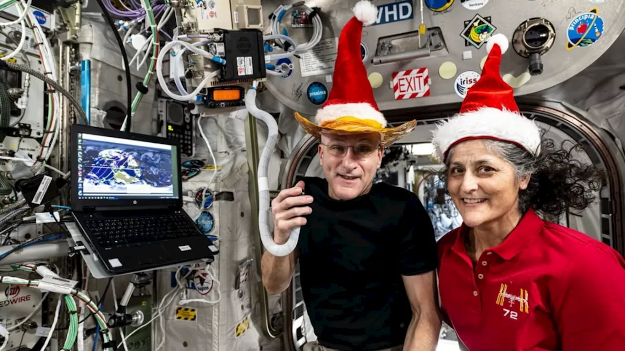 Stranded Astronauts Find Holiday Cheer in Space With Santa Hats