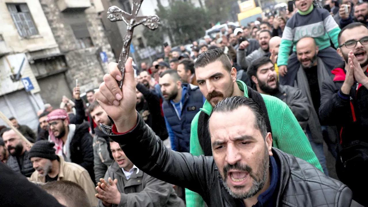 Christians Protest in Damascus After Christmas Tree Set Ablaze