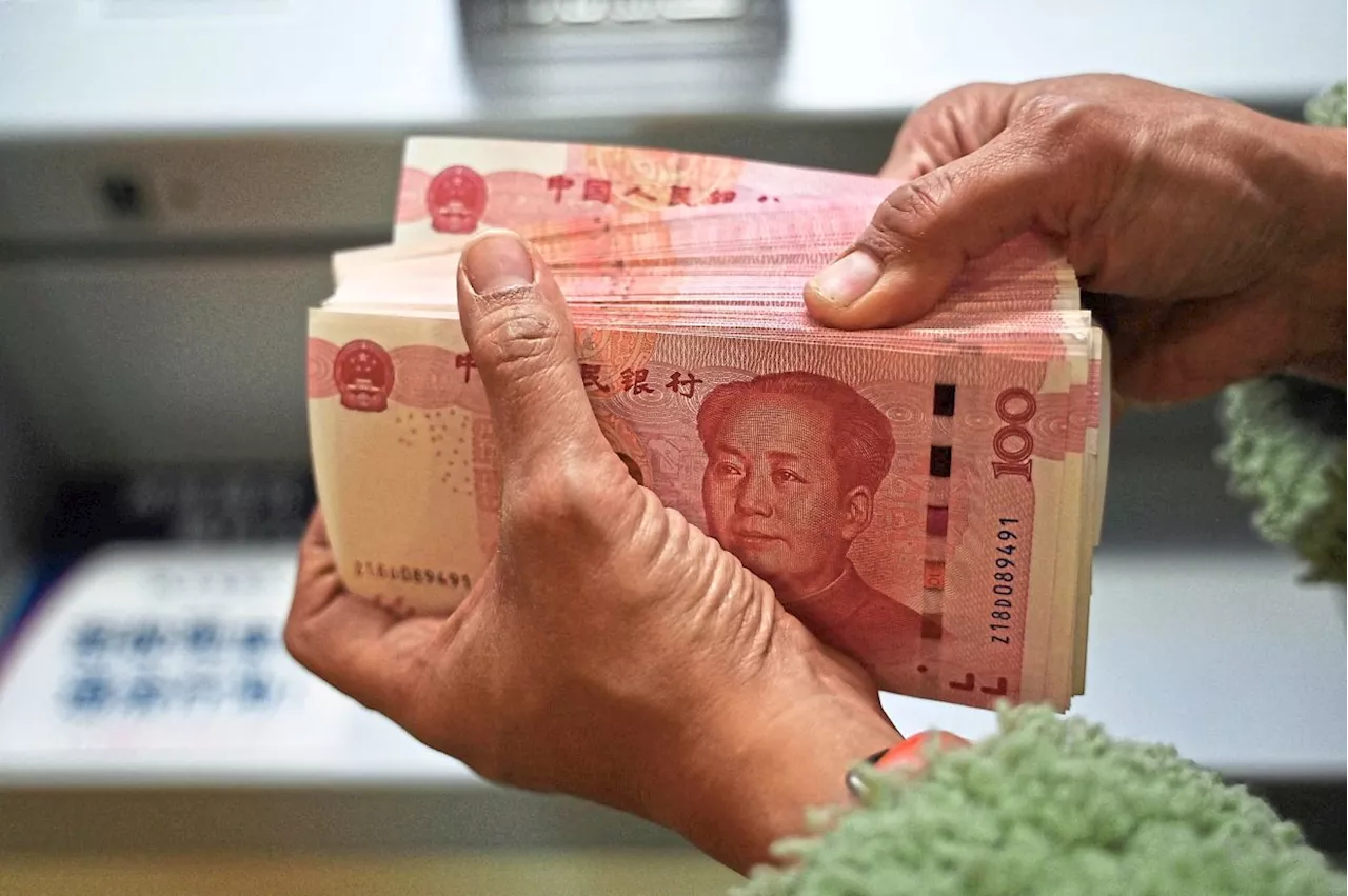 China's Yuan Dips Near 13-Month Low Amid Slow Economic Growth