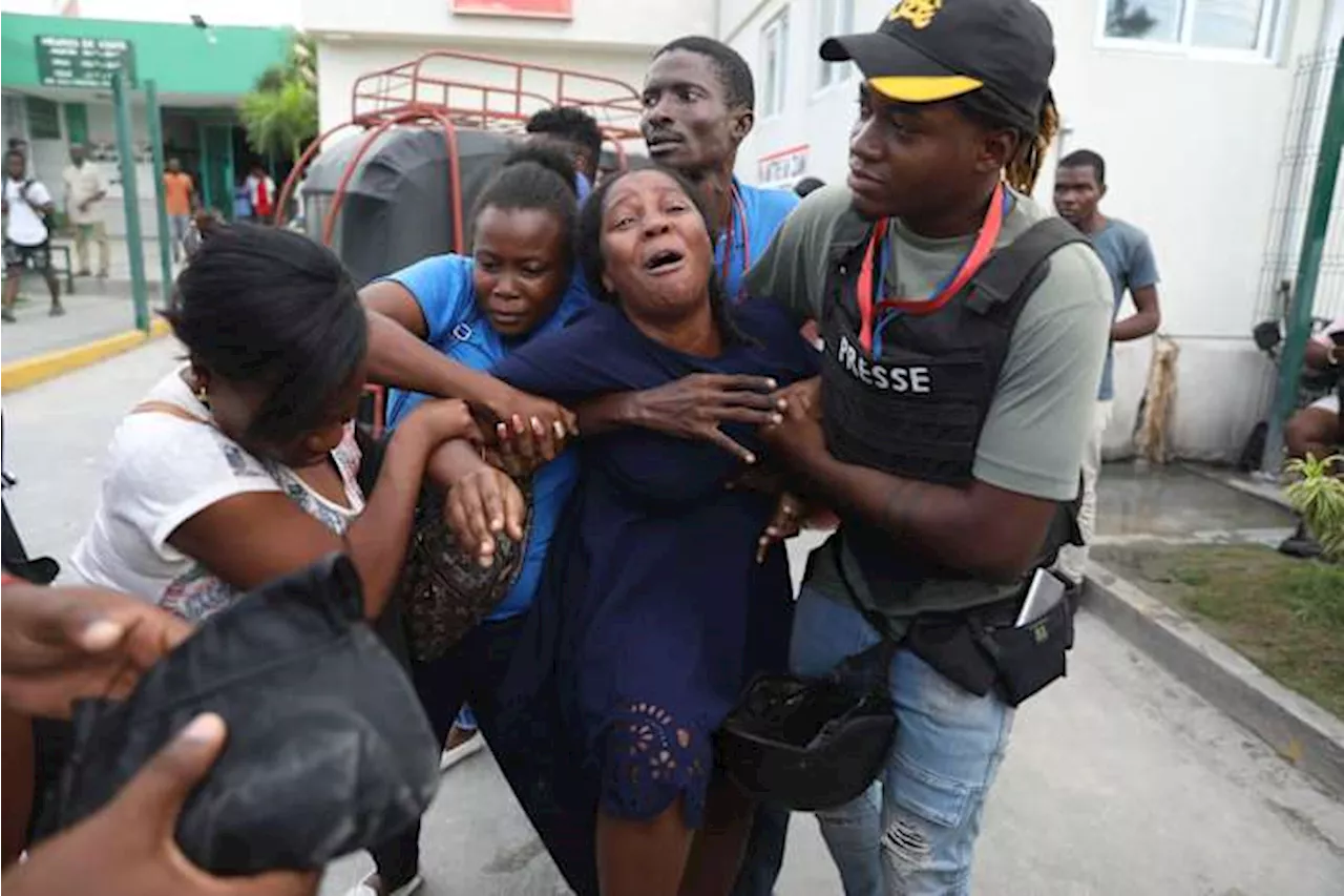 Haiti gangs fire on journalists covering a planned hospital reopening, leaving casualties