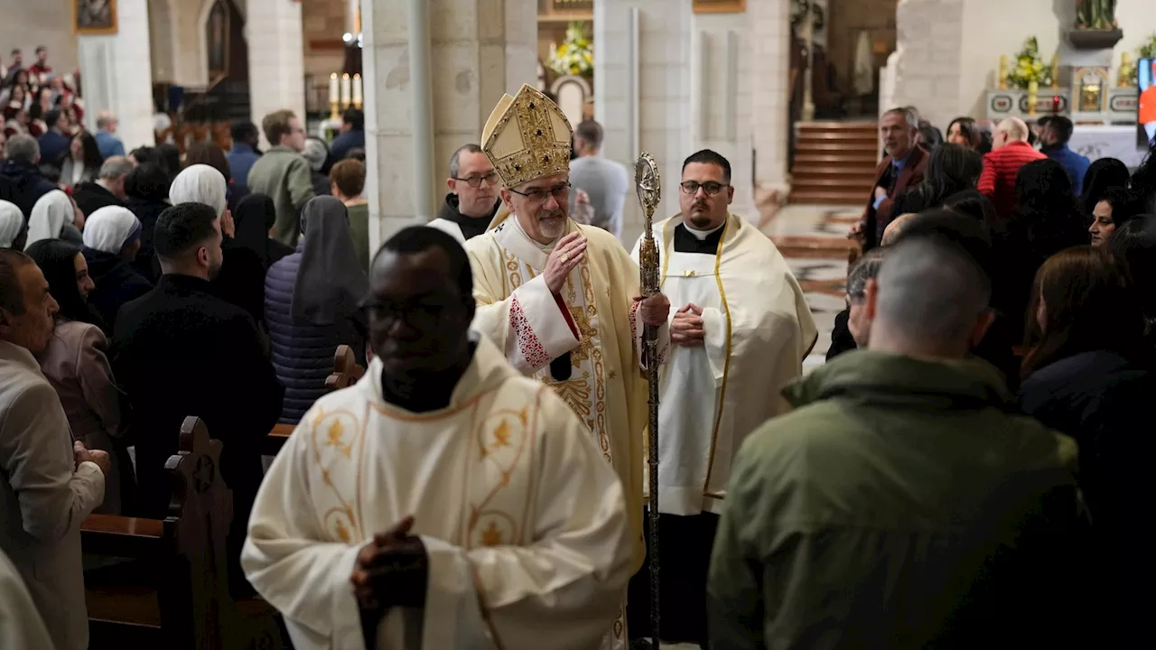 Pilgrims Mark Start of 2025 Holy Year at St. Peter's Basilica