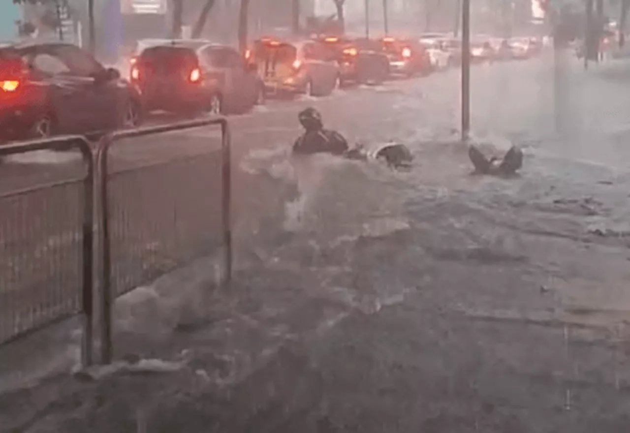 VÍDEO: motoqueiro é arrastado pelas chuvas na Avenida Rebouças, em São Paulo