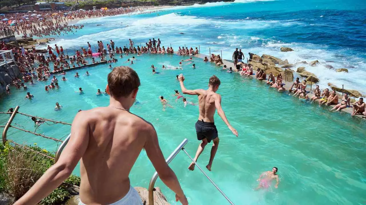 Sydney man seriously injured after slipping off cliff at popular beach