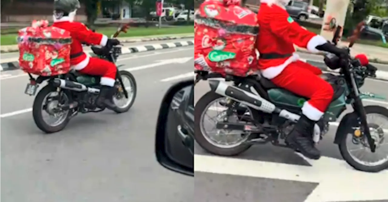 Santa's Little Helper Delivers Christmas Cheer on Food Delivery Run