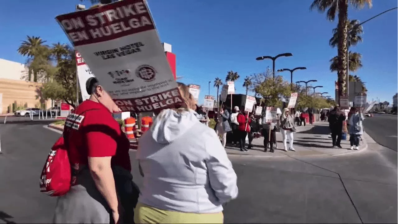 Strikers continue to demand better wages outside Virgin Hotels Las Vegas on Christmas Day