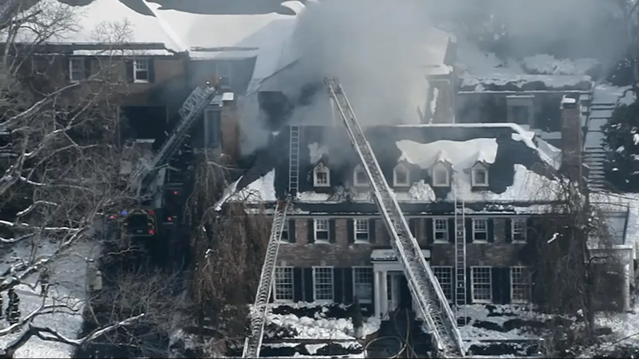 Firefighters battle blaze at multi-million dollar home in Brookline