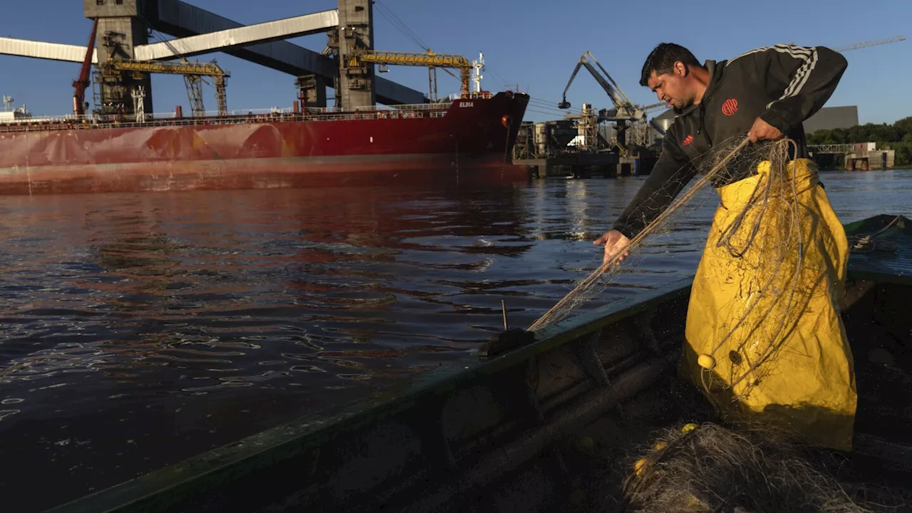 AP PHOTOS: A river route for food and crime: The dual nature of a major South American waterway