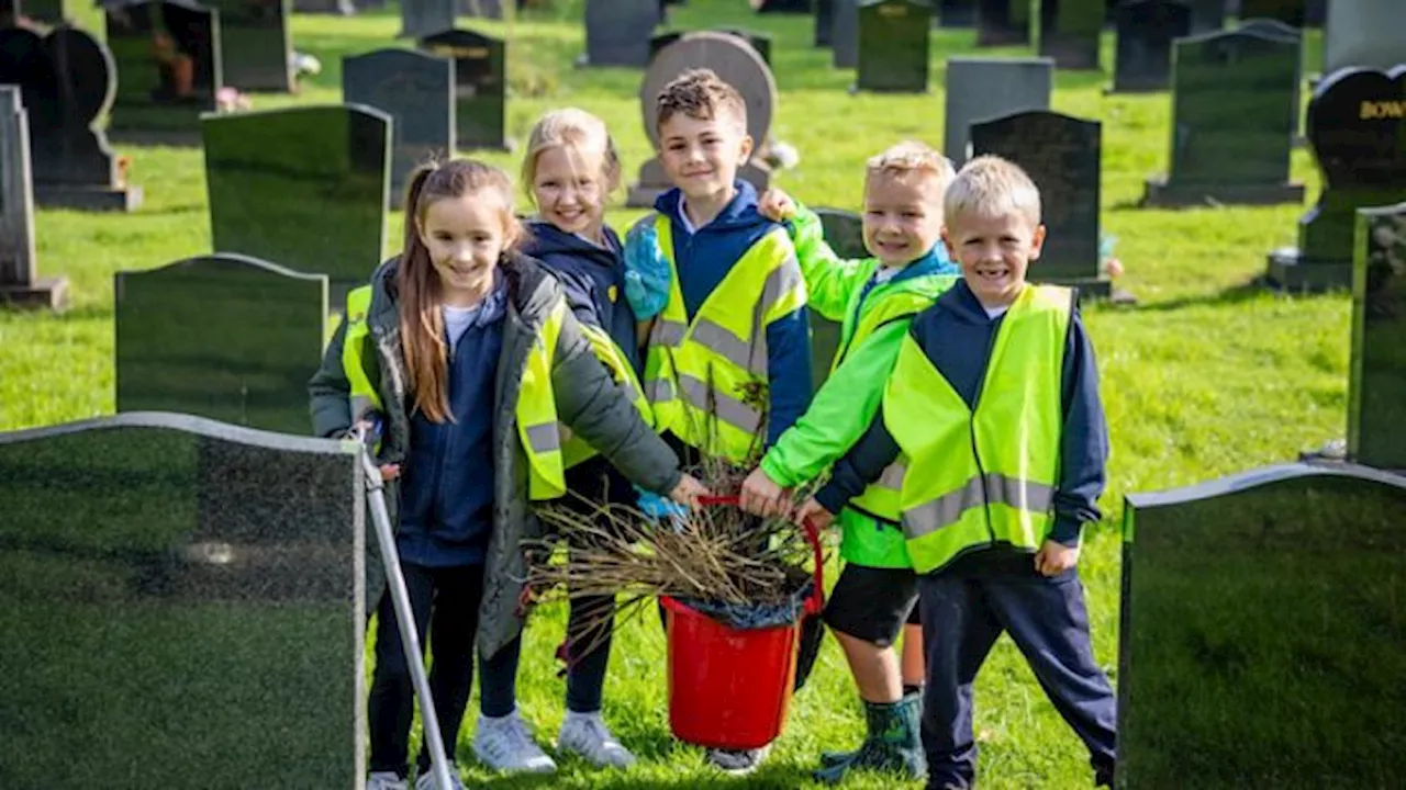 Schoolchildren and Business Network Join Forces for Cemetery Cleanup