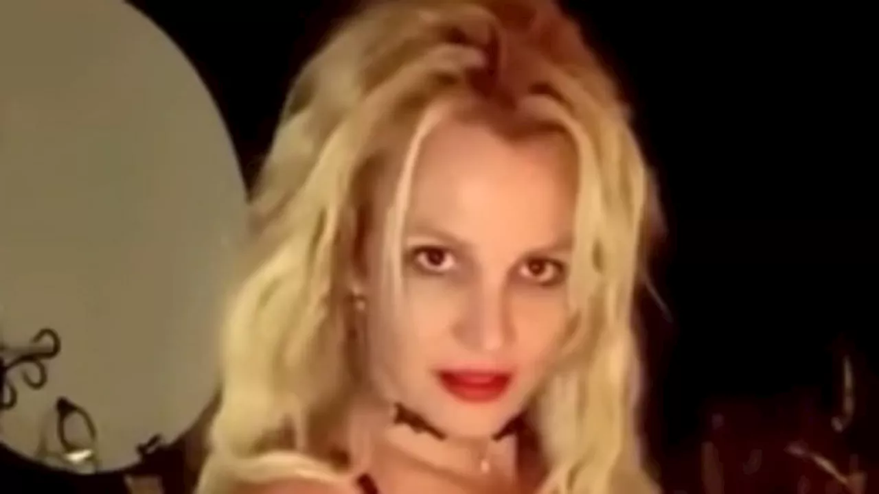 Britney Spears dances in a thong and black lace bra after reuniting with her sons on Christmas