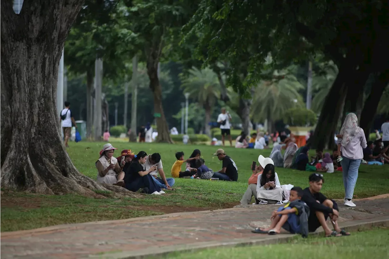 Menyiasati Rintik Hujan Agar Wisata Luar Ruang di Jakarta Tak Berantakan