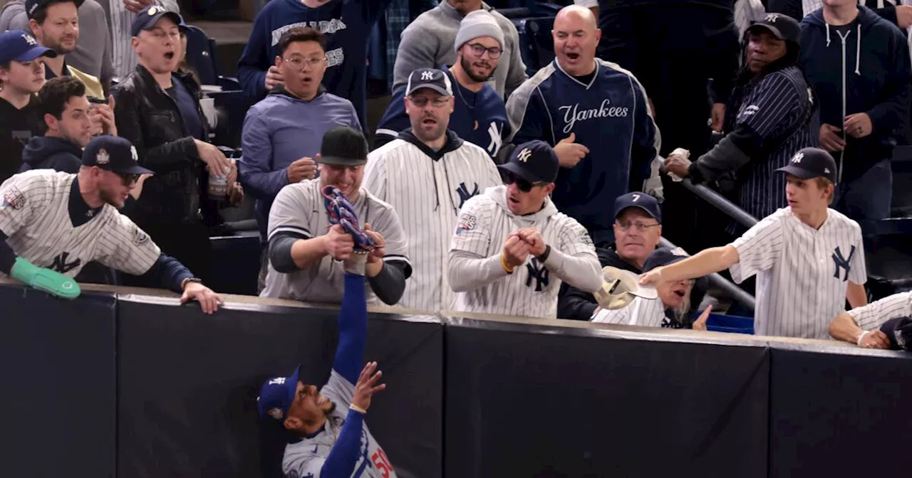 Mookie Betts 'thought about throwing a ball at' Yankees fans who grabbed his glove, wrist