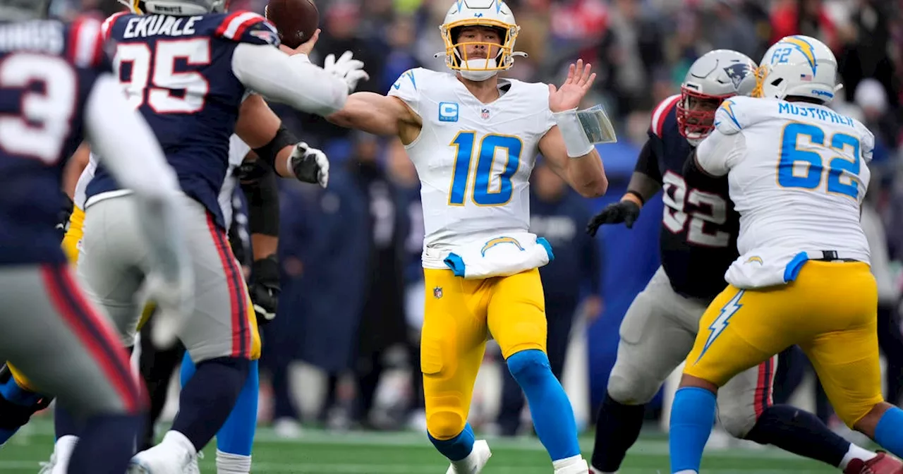 Herbert tosses 3 TD passes and Chargers secure a playoff spot with a 40-7 rout of Patriots