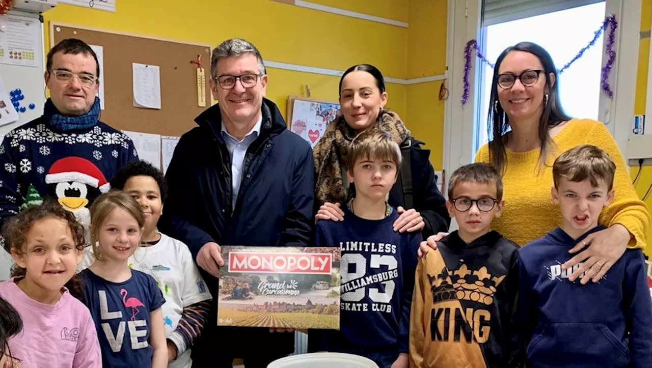 Monopoly Grand Carcassonne : Un cadeau festif pour les écoles de Trèbes