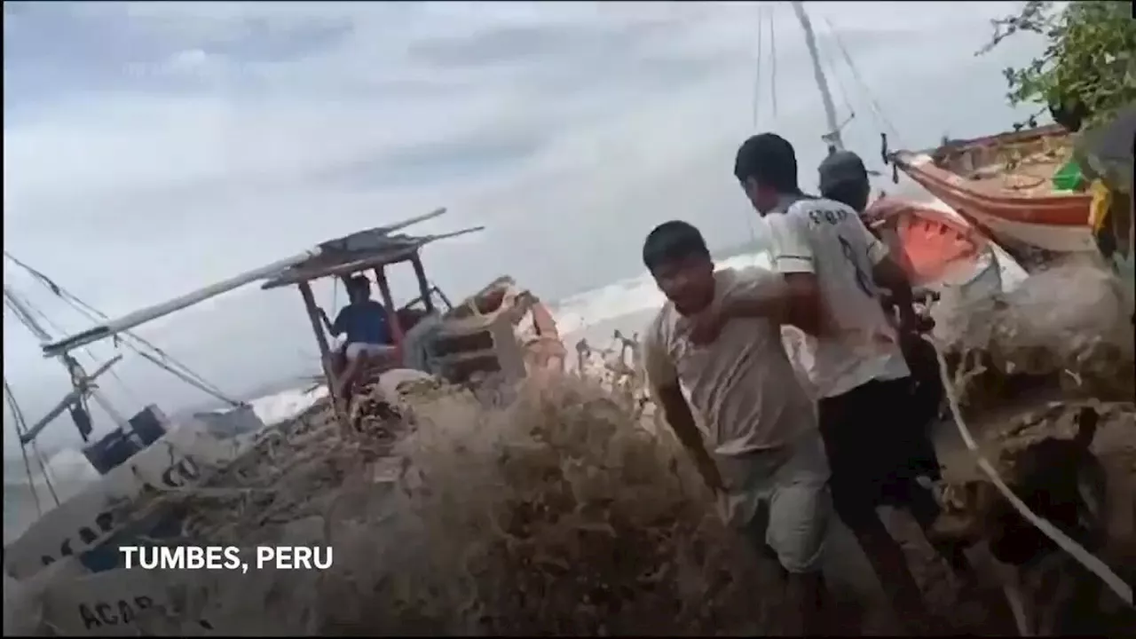 Peru Navy Rescues Fishermen Stranded by Giant Waves