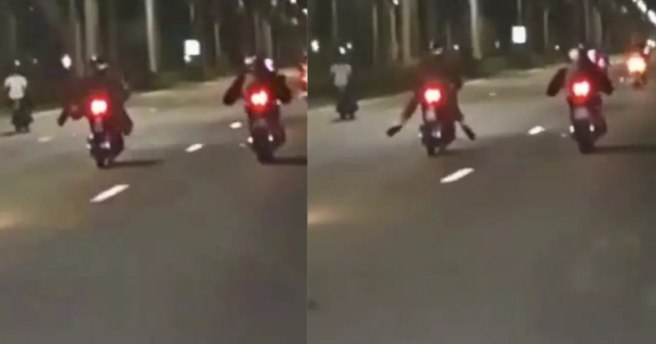 Motorcyclist Caught Performing 'Superman' Stunt on Singapore Road