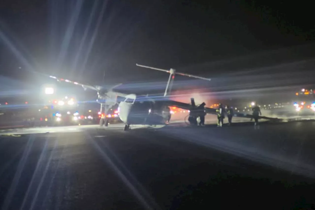 Sparks, Flames Erupt Under Plane Wing During Halifax Landing