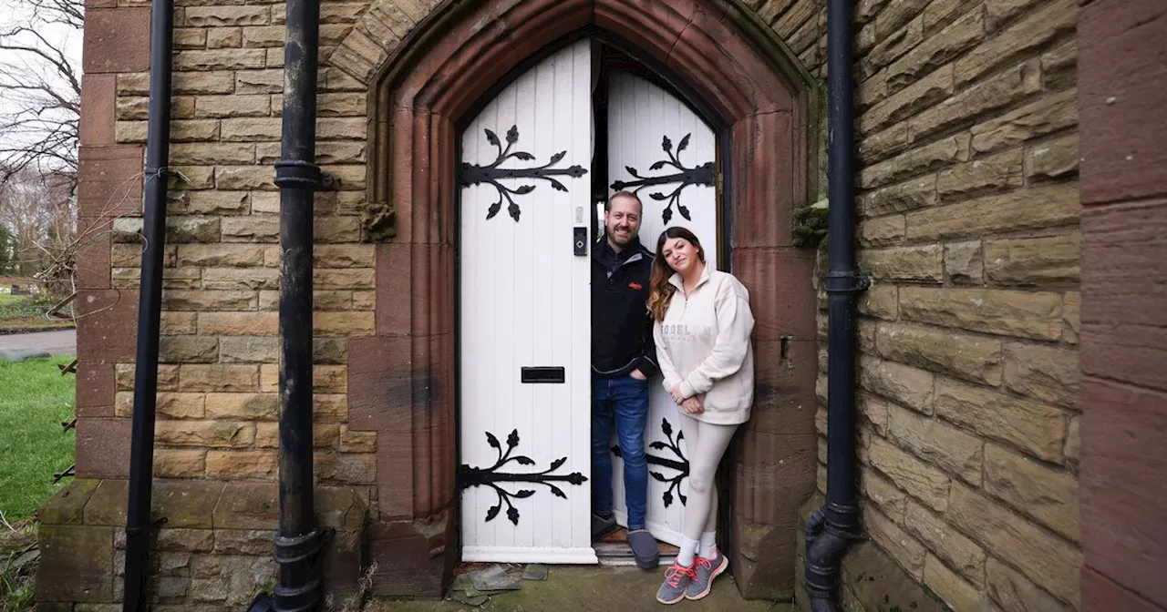 Family living in a cemetery house