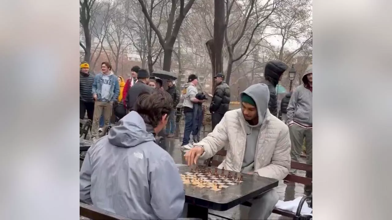 Victor Wembanyama plays chess in the rain at Washington Square Park