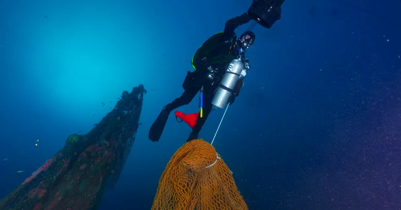 Divers Clear Ghost Nets From Sunken Submarine