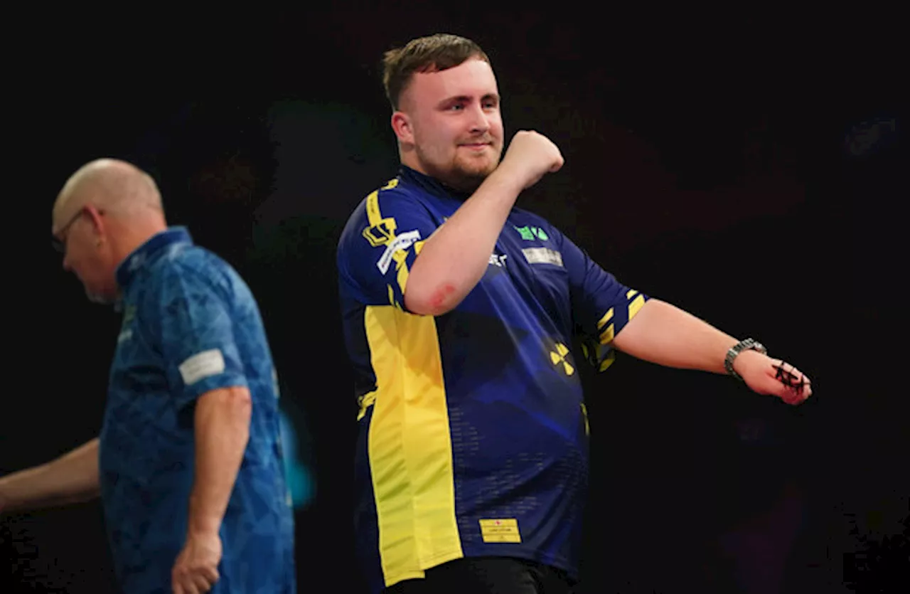 Luke Littler overcomes slow start to progress at World Darts Championship