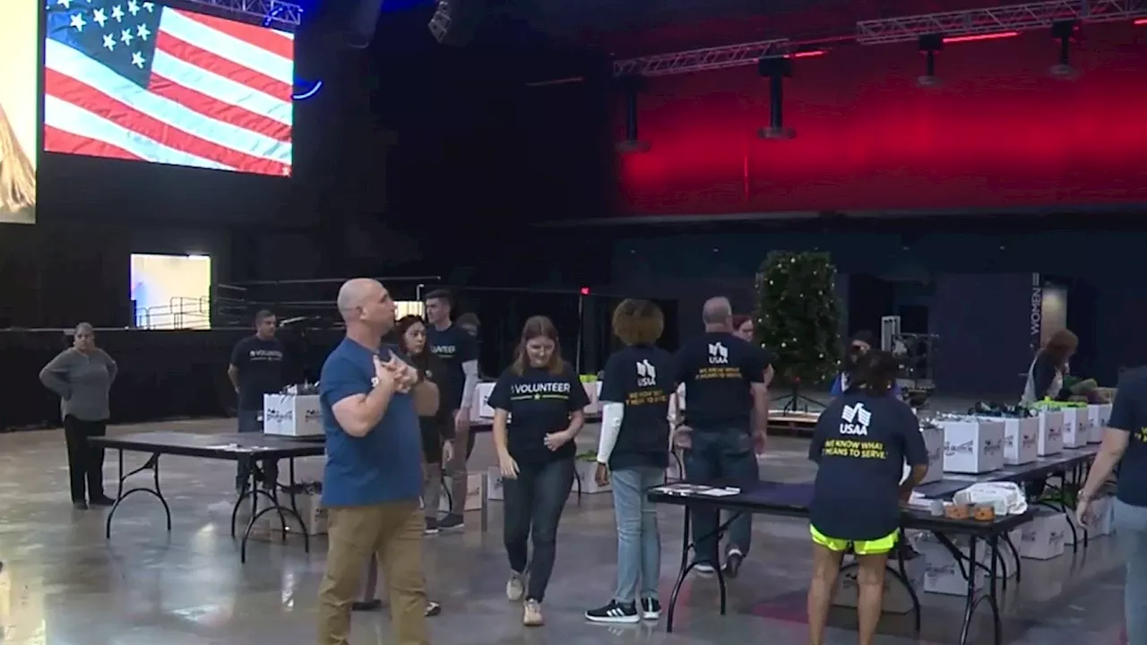 Volunteers assemble 5,000 care packages for military graduates