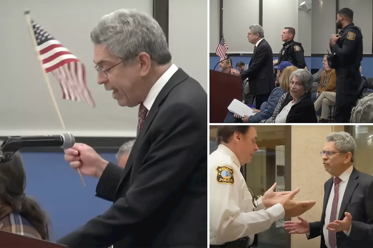 NJ lawyer tossed out of town council meeting for waving American flag to protest new ban