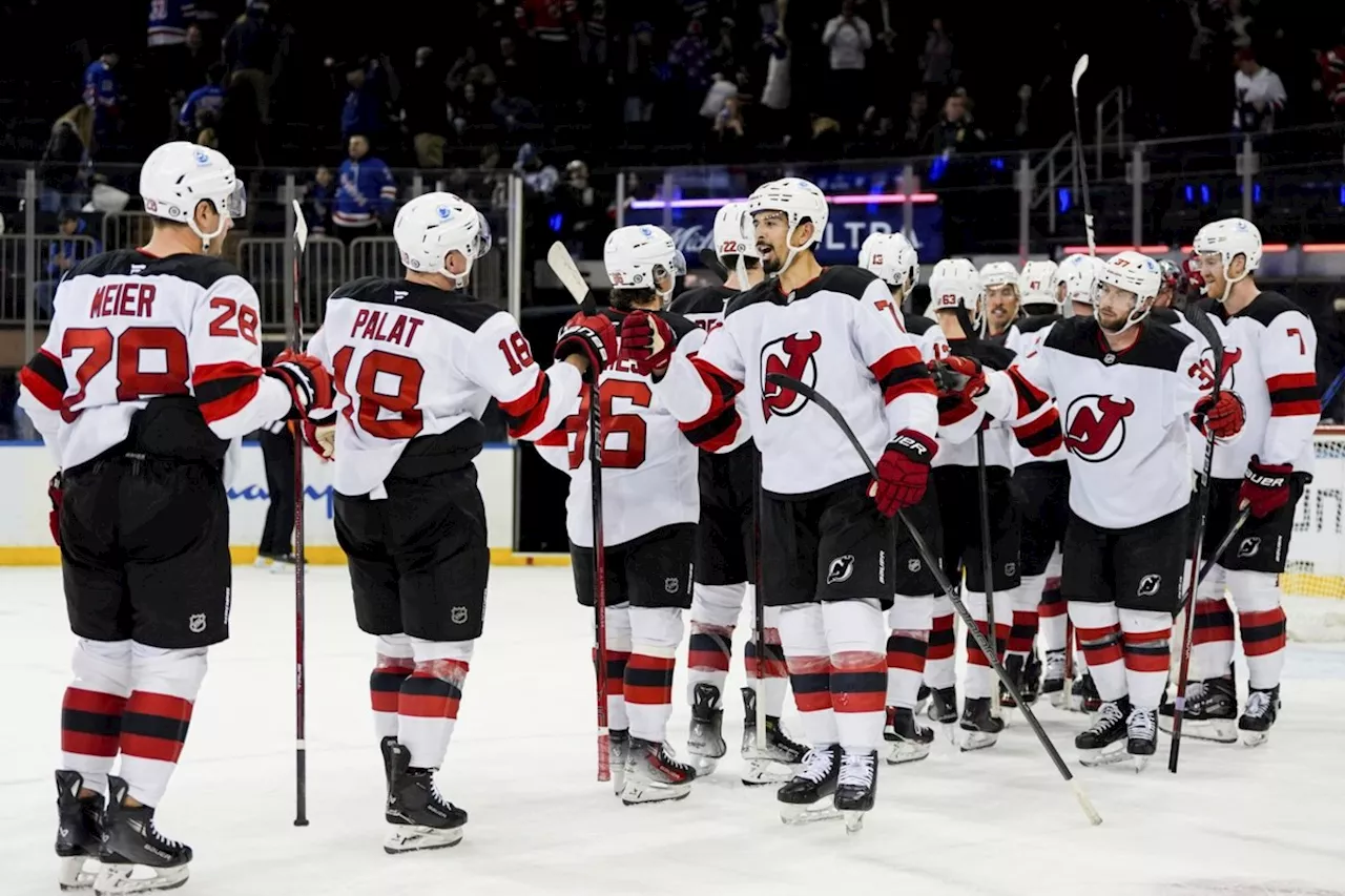 Bratt’s 4-point night helps Devils beat Rangers 5-1