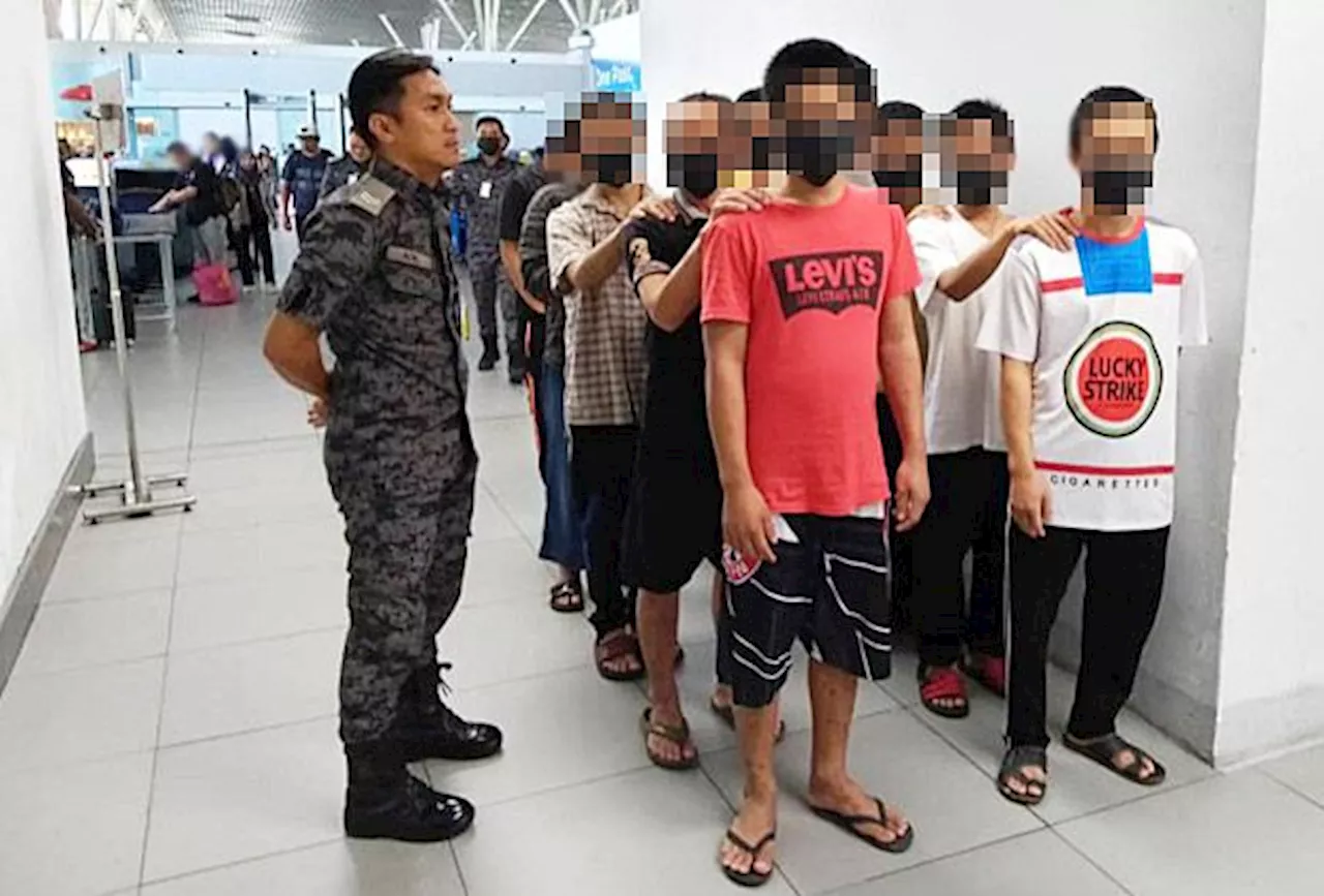 Sabah Immigration deports 13 Vietnamese men