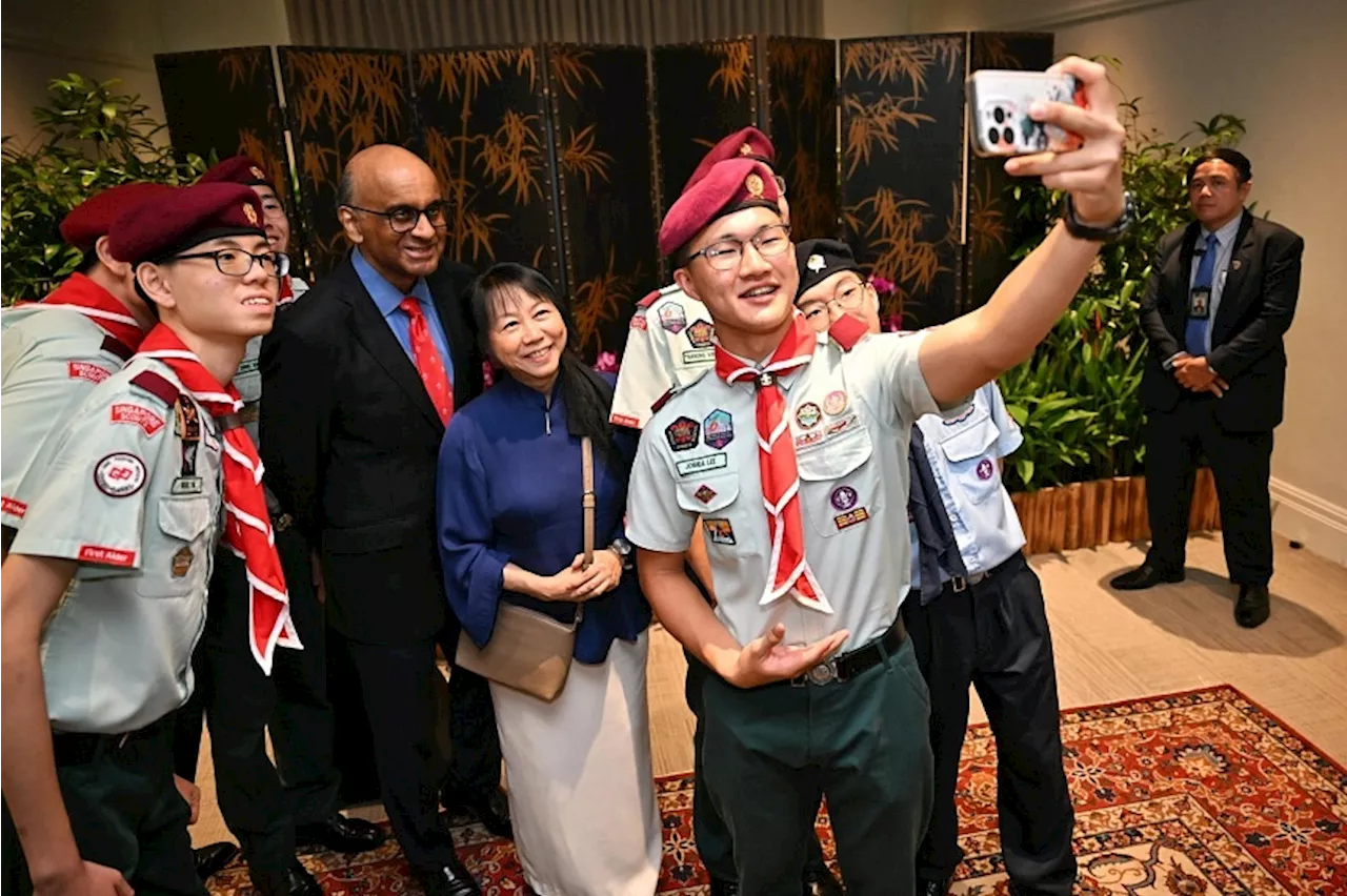 Outstanding Scouts and Guides receive awards from President Tharman